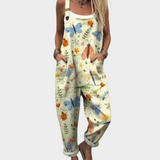 Byxdress med akvarellblommor Creme