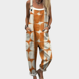 Latzhose med batikcirklar orange
