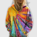 Clara | Oversized huvtröja med solmotiv i patchwork