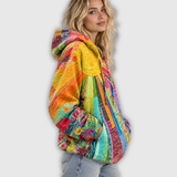 Clara | Oversized huvtröja med solmotiv i patchwork