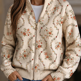 Persephone – Cardigan med blommönster på krämvit botten